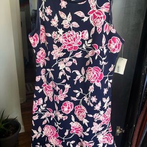Floral sleeveless dress with layered hem.